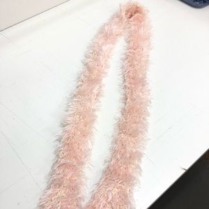 Pink hand knitted scarf